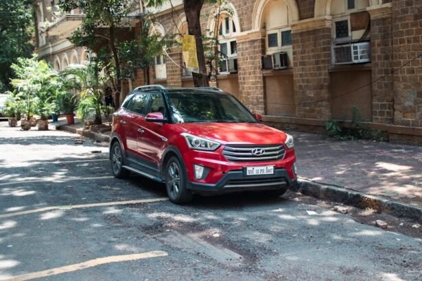 A red suv is parked on a street.